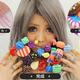 Illustration for article titled Woman Uses Her Unbelievable Fingernails To Promote emCandy Crush/em